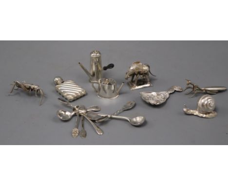 A Victorian silver caddy spoon, a similar silver miniature 'chocolate pot' pepperette and teapot and twelve other items, incl