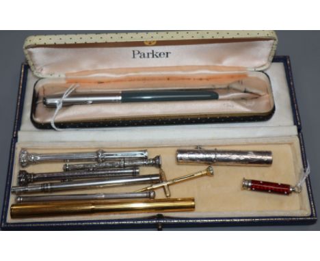 A Dunhill gold-plated fountain pen, 14ct gold nib, a miniature guilloche enamel propelling pencil and eight other items, incl