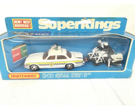 A Boxed Superkings Jaguar XJ/12 Police Set. # K-66.
