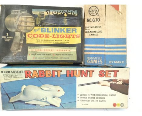 A Boxed Playcraft Toys Blinker Code-Lights (Damaged). A Marx Bagatelle Board (Damaged) and a Rabbit Hunt Set. All Boxed.