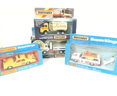 4 X Boxed Matchbox Superkings including a Volvo Ambulance # K-96. A Plymouth Taxi # K-79. A Crane Truck # K-148 and a Petrol 