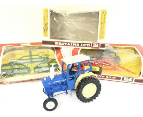 3 X Boxed Britains Farm Implements including a Ford Tractor #9524. A Gang Roller and a Seed Drill.