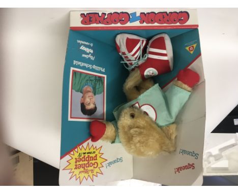 A collection of figures including .. a Squeak Philip Schofield Gordon the gopher puppet..Sweet secrets..Pound puppy..Sarah ka
