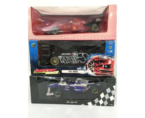 3 X Boxed Die-Cast Vehicles. A Minichamps Renault Damon Hill F1 Car. A Muscle Machines Import Tuner and a Michael Schumacher 