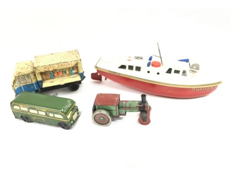 4 Tin Plate toys including a Chad Valley Clockwork Snack Bar. A Chad. Valley Bus. A Wells steam Roller.and a Jupiter Ocean Pi