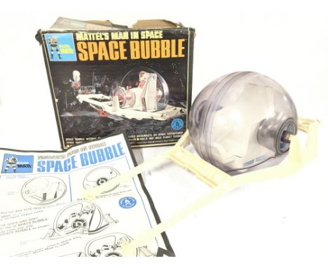 A Boxed Vintage Mattel Man In Space Space Bubble. Box is worn. Pats Missing.