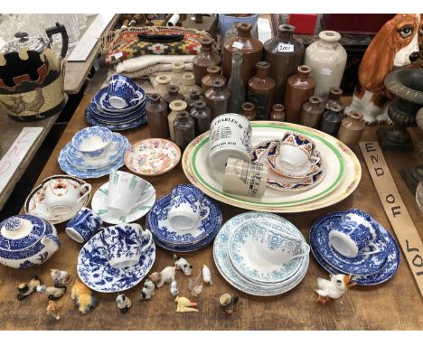 Stoneware bottles and flasks, tea wares, Wade whimsies, etc.