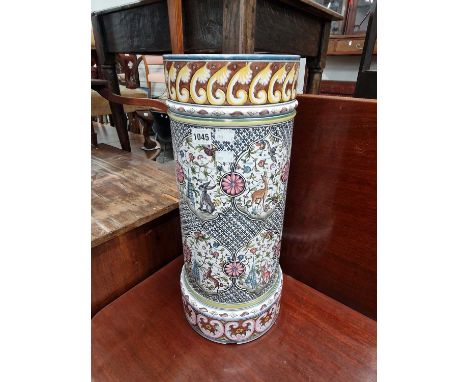 A continental pottery stick stand.
