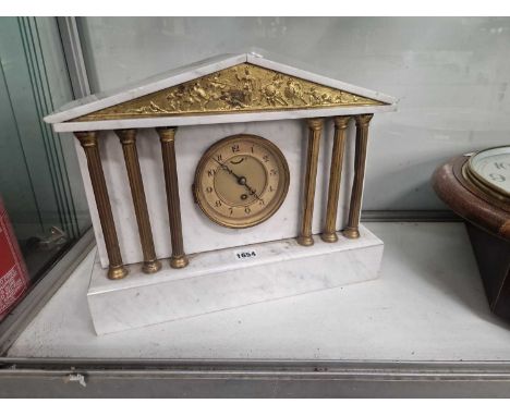 An architectural white marble cased mantle clock