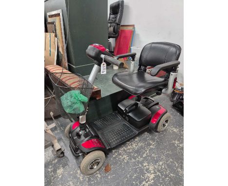 A TGA mobility scooter with charger and key
