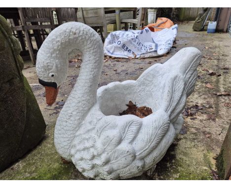 A composite swan form planter