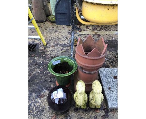 A castellated chimney pot and three garden figures and a Whichford glazed planter