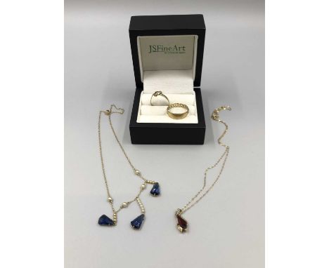 A vintage multi-drop necklace, the chain assessed as 9ct gold, the drop setting as base metal, together with two 9ct hallmark