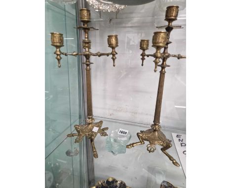 A pair of ormolu four light candelabra