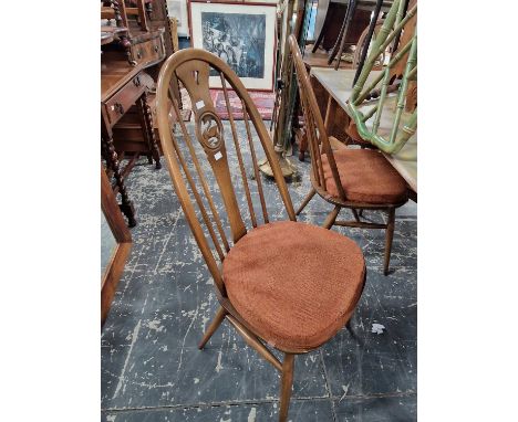 A set of six ercol high back dining chairs 