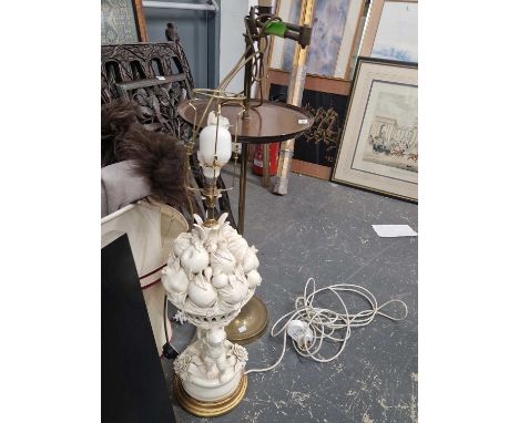A Vintage brass standard lamp with mahogany platform together with a white porcelain large table lamp.
