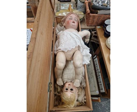two large antique bisque head dolls.
