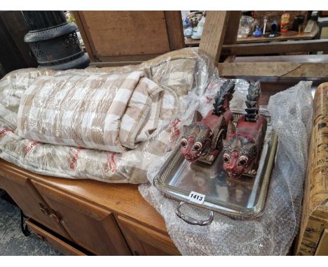 A pair of carved oriental dragons, two plated dishes, curtains etc.