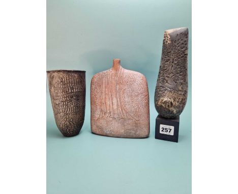 Attributed to Peter Hayes, two studio pottery vessels and a blade sculpture, each with a lizard skin texture, the blade.   H 