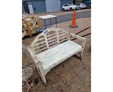A vintage cream panted garden bench. H 90 W 125 D 60cm