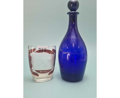 A late 19th century ruby overlay glass vase engraved with a view of Lucerne.   H 9.5cms together with a blue glass decanter w