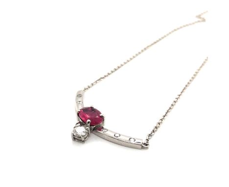 A hand-crafted bespoke ruby and diamond necklace. Assessed as 18ct white gold. Length 52 cms. Weight 6.76 grams.