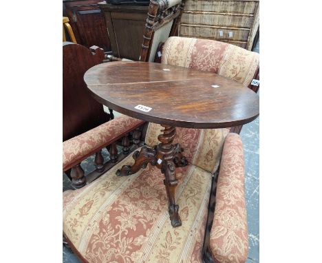 A Victorian small tripod table.