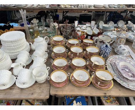 A Wedgwood white dinner and tea set, New Chelsea soup bowls, a ceramic cased clock and a two handled cock fighting mug