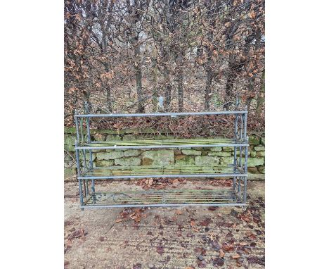 A wrought iron and brass-mounted wall shelf /rack H 158 W 113cms