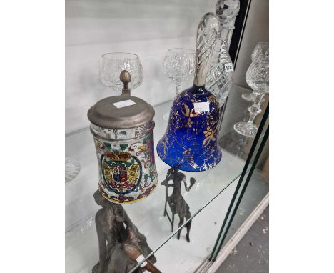 An Edinburgh Crystal decanter and six goblets, a blue glass hand bell and a pewter lidded mug
