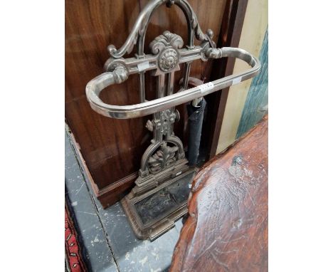 A cast iron hall way stick stand.