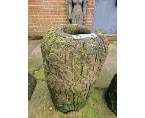 A Tall far eastern stone terrace vase/ planter, decorated with butterflies and foliage
