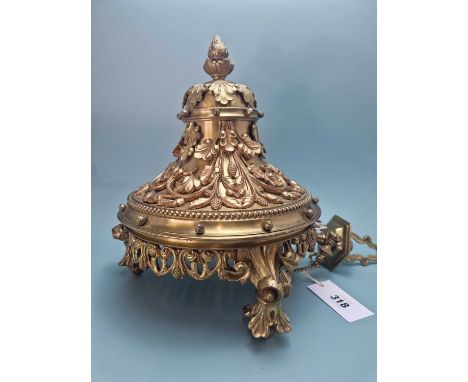 A gilt metal ceiling light fitting, the pendant base applied with seed heads and foliage and forming a bowl for the light, th