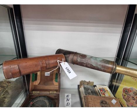 A leather cased four draw telescope together with a 1915 Beck three draw telescope