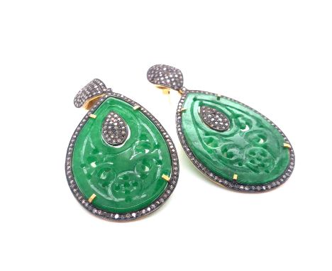 A pair of carved green jade and multi-diamond articulating drop earrings. Drop 6.3 cm widest point 3.1 cm. Unhallmarked, asse