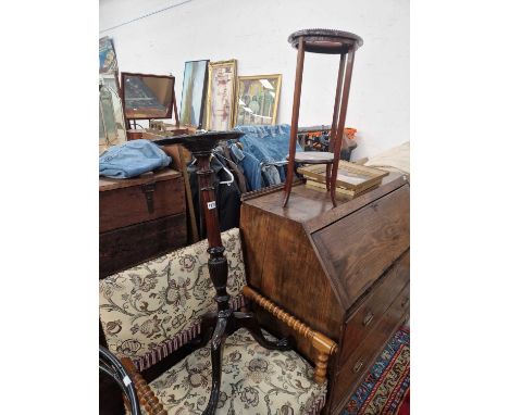 An antique mahogany tripod base plant stand and a two tier occasional table.