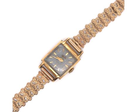 A vintage Enicar wristwatch on a 9ct hallmarked gold brutalist style bracelet strap. Dated 1972, Birmingham. Gross weight 13.