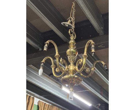 A brass five arm chandelier