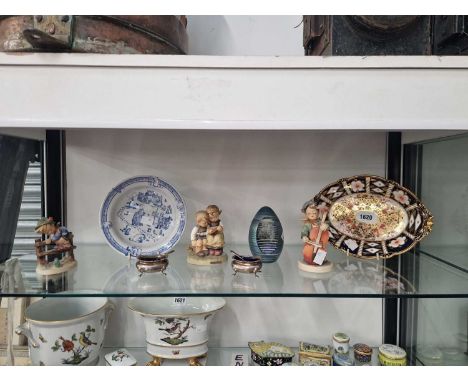 A pair of silver salts, Hummel figures, an Okra glass paperweight, a child's blue and white bowl together with a Crown Derby 