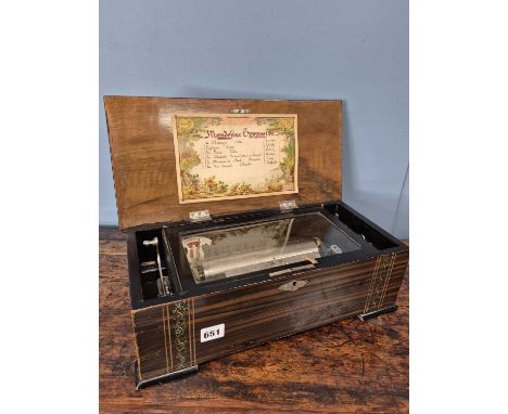 A 19th century Lever wound cylinder music box playing six airs with "Mandoline expressive" tune sheet  Mahogany and inlaid ou