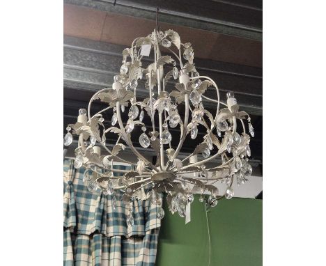 A white painted metal and glass eight arm chandelier
