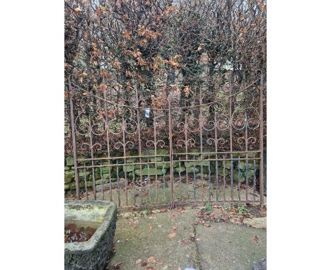 A pair of wrought iron driveway gates. Each gate H 164cm Width 110 cm