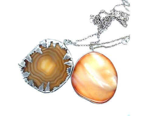 Two vintage silver-mounted large agate slices complete with long silver chains. 