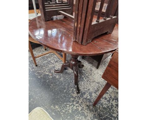 An early yew wood country tripod table.