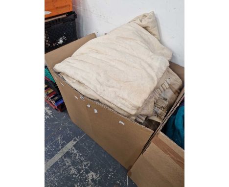 A large collection of pale cream damask interlined curtains.