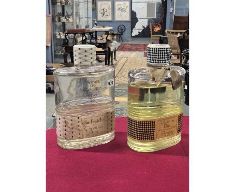 Two large display-size bottles of Cristian Dior perfume scent. H 31cms