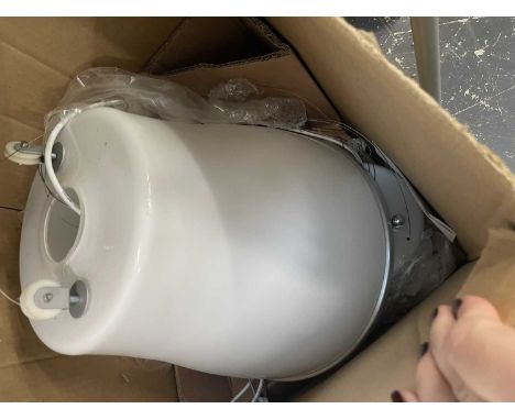 A height adjustable ceiling light with an inverted bucket shaped shade