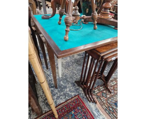 A vintage 1970's mahogany fold over card table.