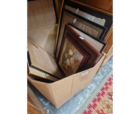 A small collection of various artworks, including etching oil paintings and other pictures.