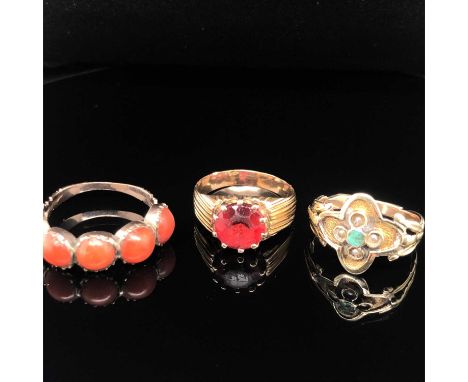A vintage signet type ring, assessed as 9ct gold, a further re-shanked ring assessed as 10ct gold, and an antique cabochon ri